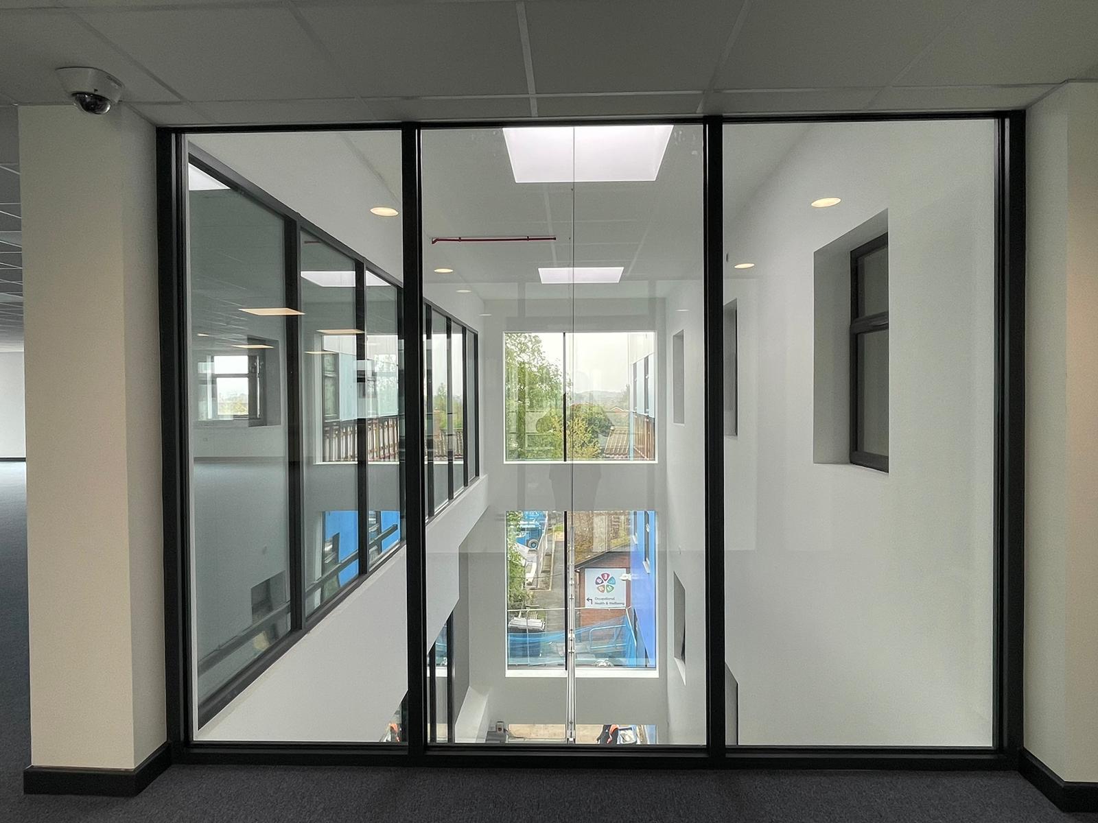 Glazed education circulation space overlooking a central stairwell