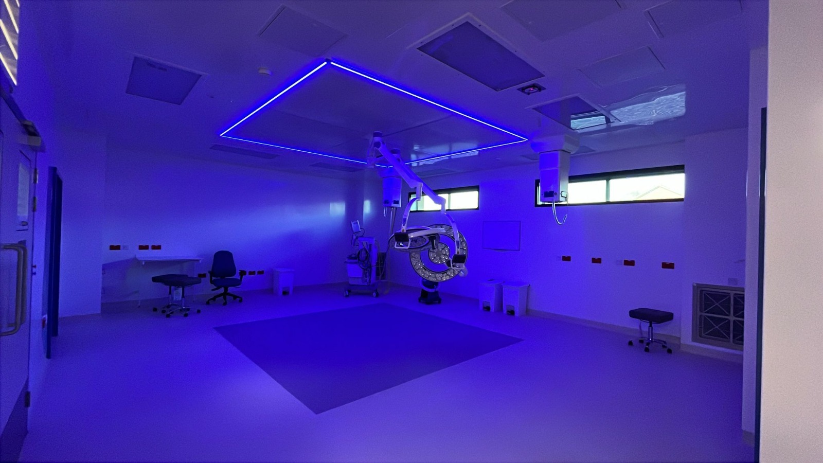 Completed ultra-clean operating theatre with blue clinical lighting